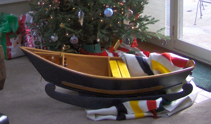 Designed and built by veteran boat builders Gregg Hatten and Roger Fletcher, this handcrafted wooden rocking boat is a replica of the historic McKenzie Style Drift Boats that run the Big Water Rivers of the Pacific Northwest. (Does this little boat seem familiar? Maybe thats because it's a 1/3 scale version of Portola featured on the cover of Epoxyworks 35.)