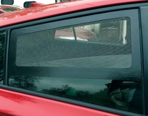 The car camping screen, installed and ready to keep mosquitoes at bay.