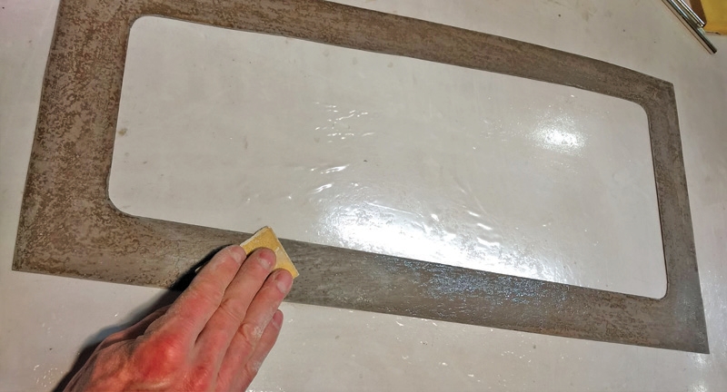 Allow the epoxy to fully cure, then sand surfaces dull and remove any burrs from the edges.